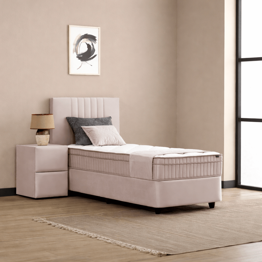 Opbergbed Clara Beige 1-persoons met luxe hoofdbord met oren.