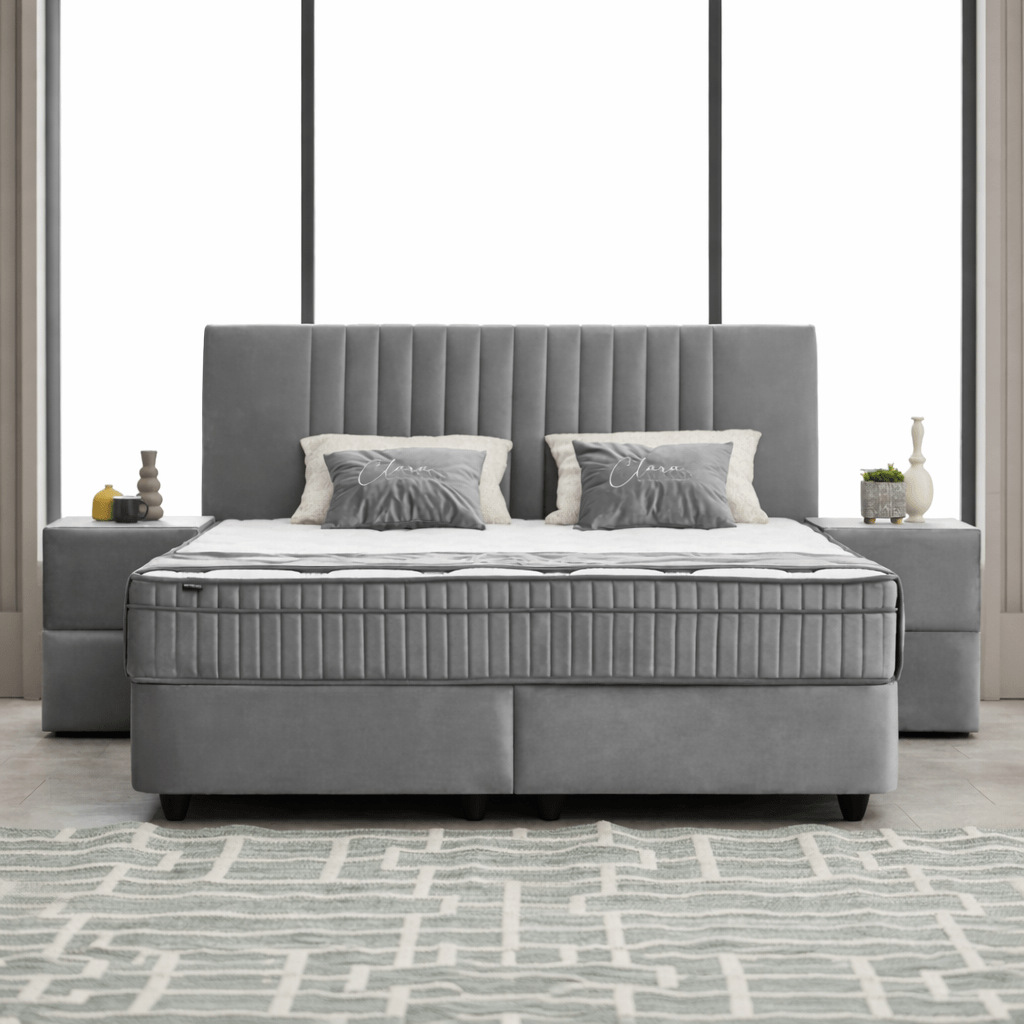Opbergboxspring Clara Grijs met luxe blokkenpatroon hoofdbord en opbergboxen.