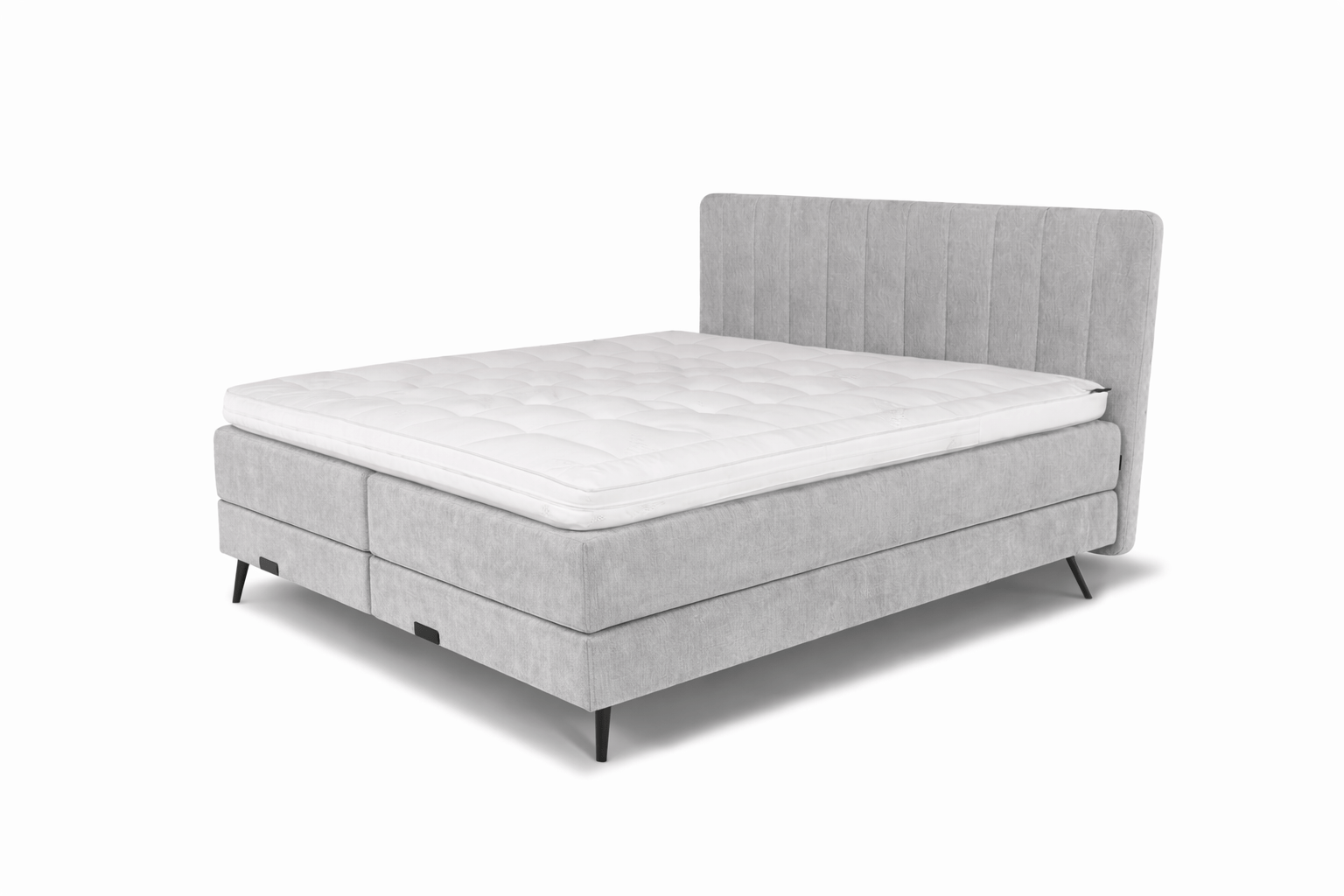 De complete Caresse 3400 Elektrisch boxspring met gestoffeerd hoofdbord in banen.